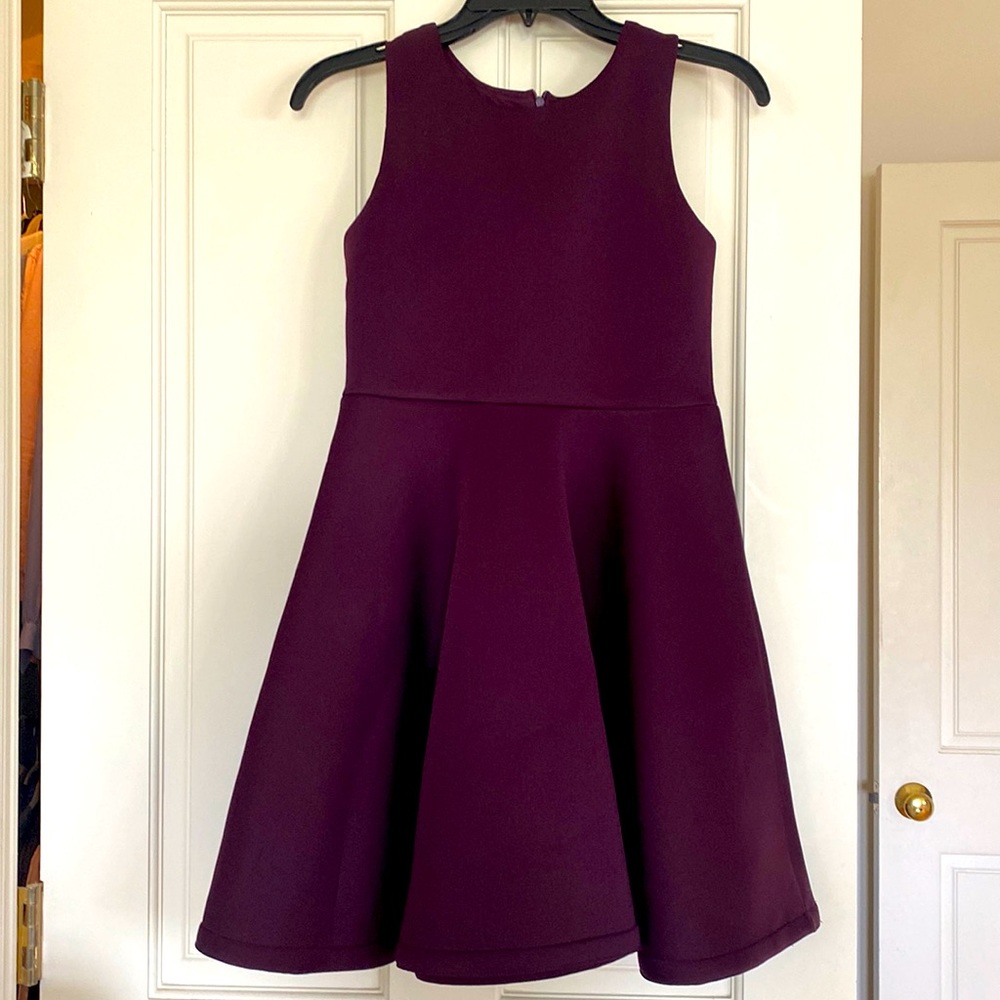 Wine colored girls size, stretchy and structured